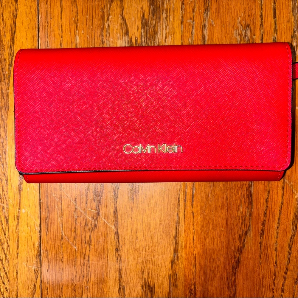 Cherry red leather Calvin Klein trifold wallet